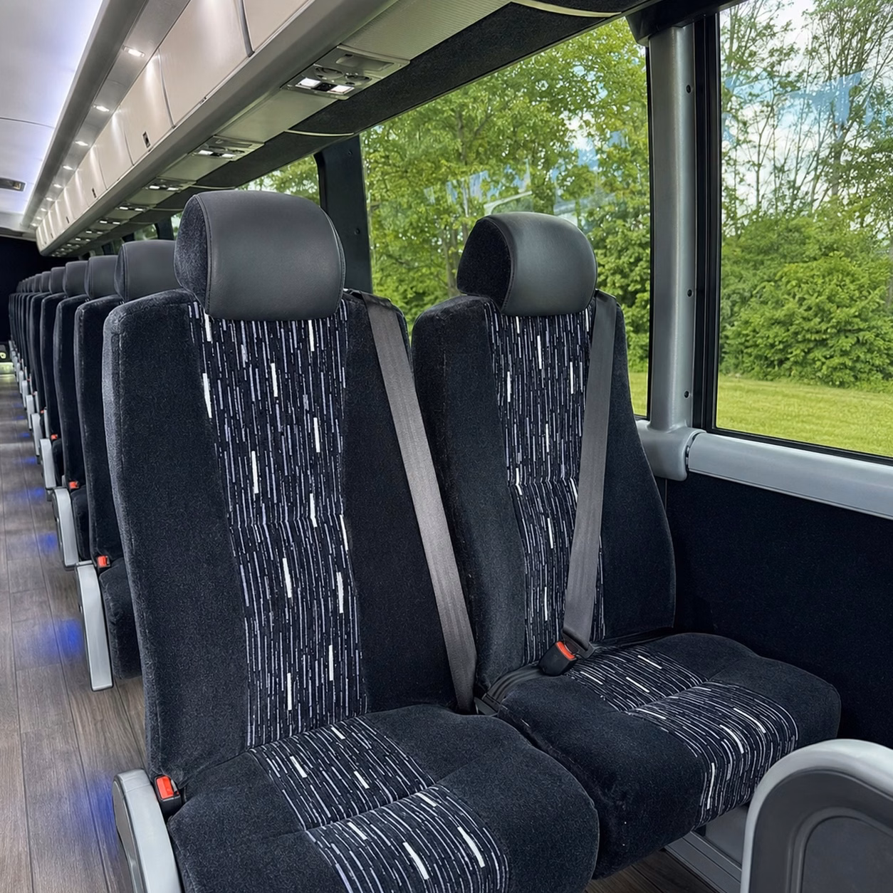 how time of year and peak seasons affect charter bus rental prices in johns creek